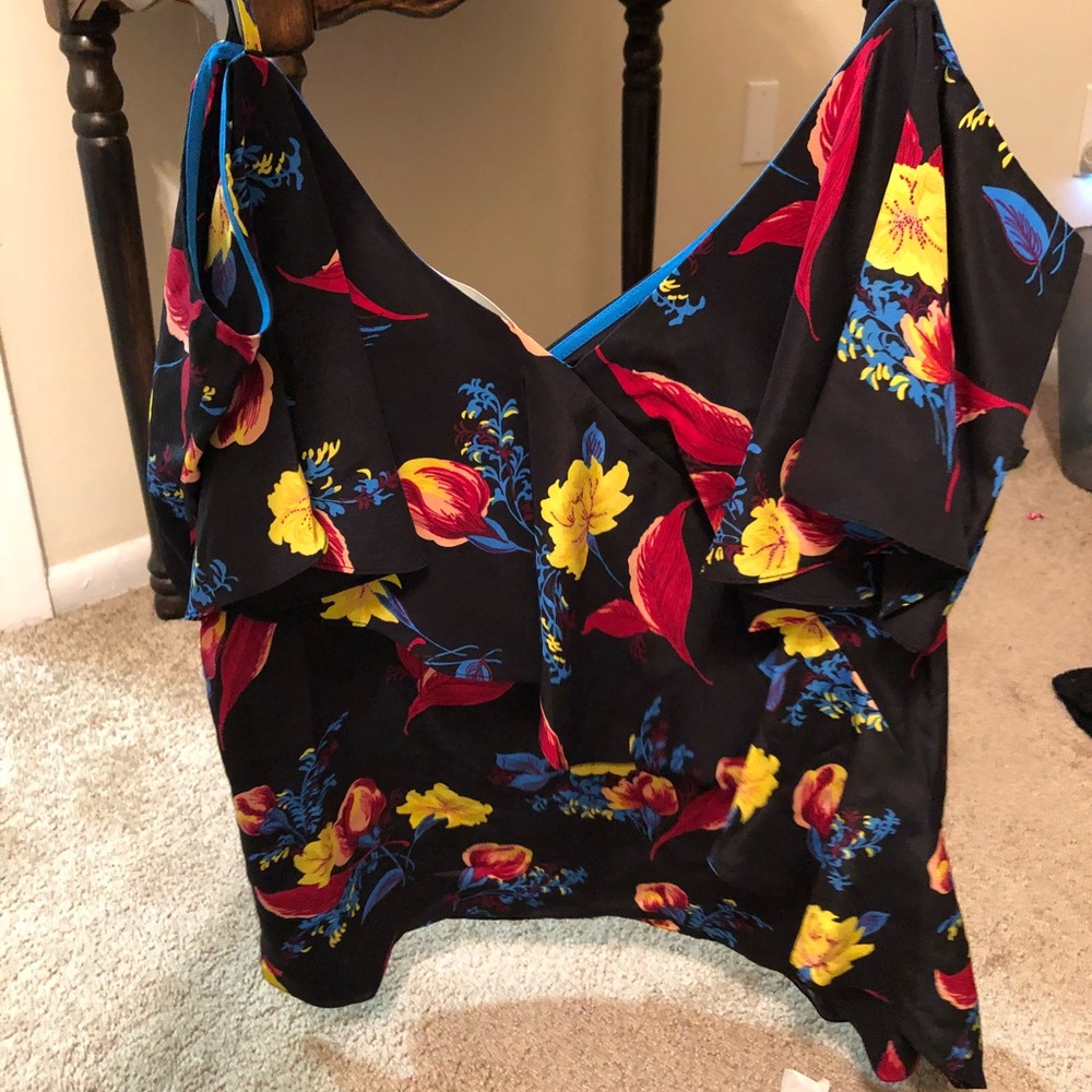 Sleeveless floral ruffled cami.